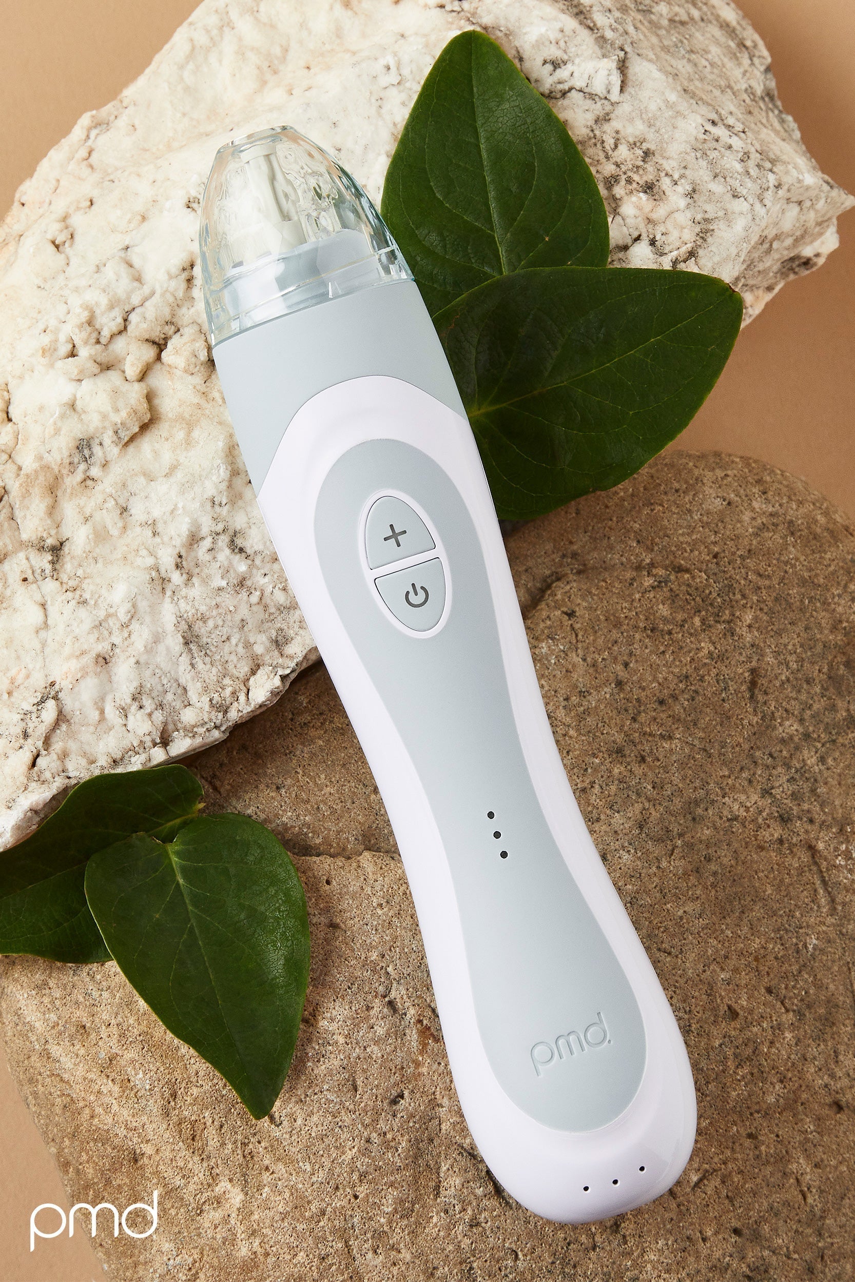 PMD Beauty Personal Microderm Elite Pro at-home microdermabrasion device with 3 luxe caps, 3 speed settings, 3 suction options, and cordless rechargeable design for professional-level skin exfoliation.