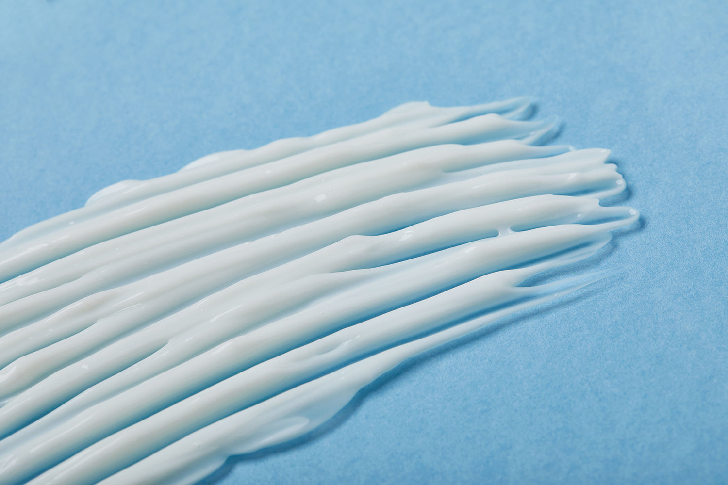 moisturizer spread with blue background