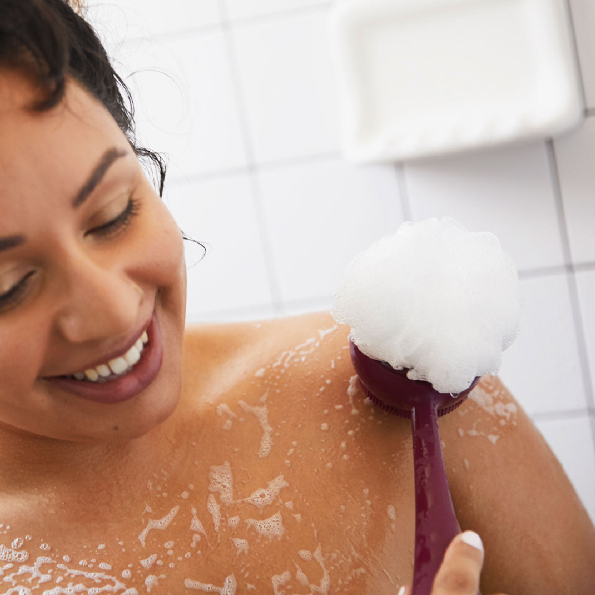 Gently cleanse with soft silicone bristles