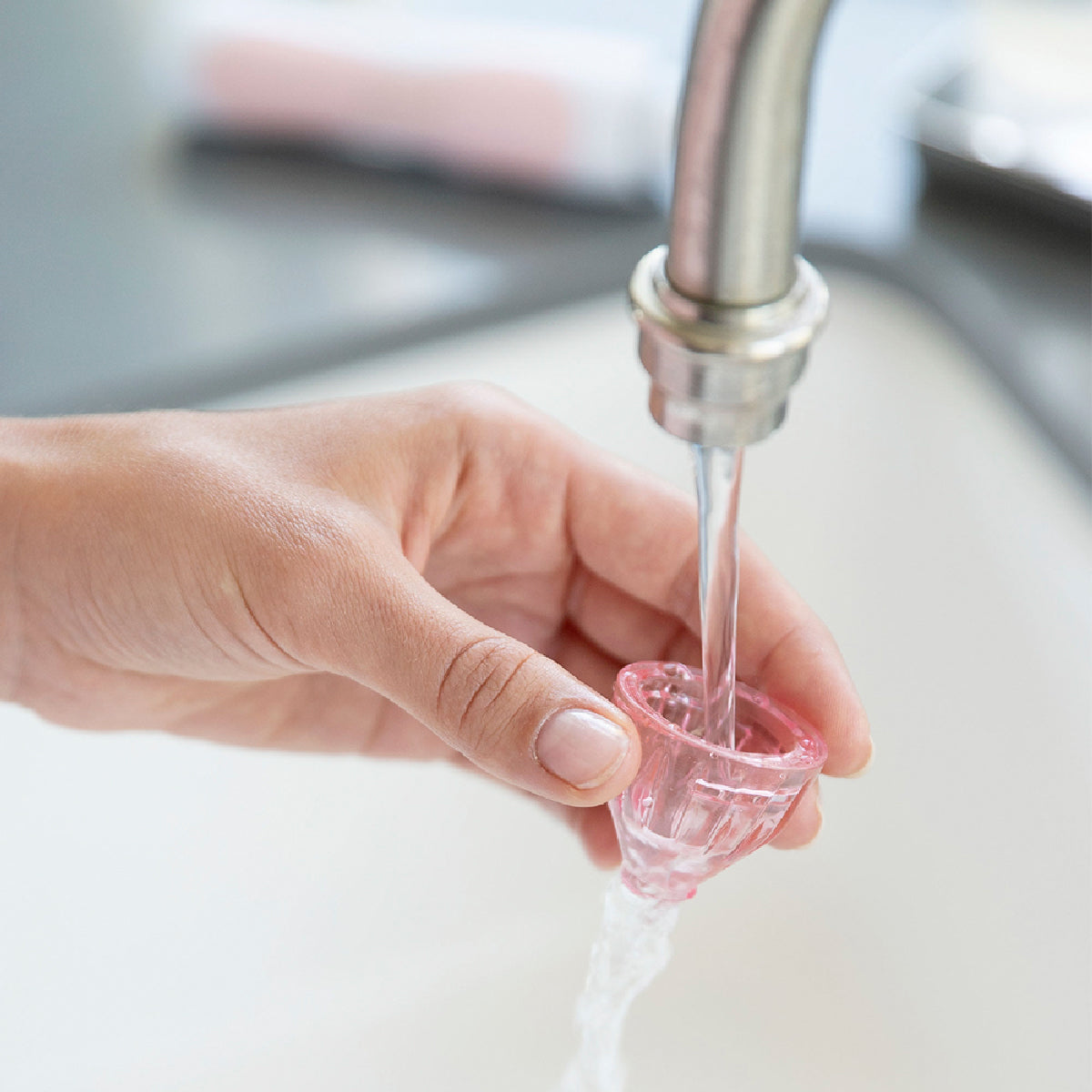 rinsing cap under water