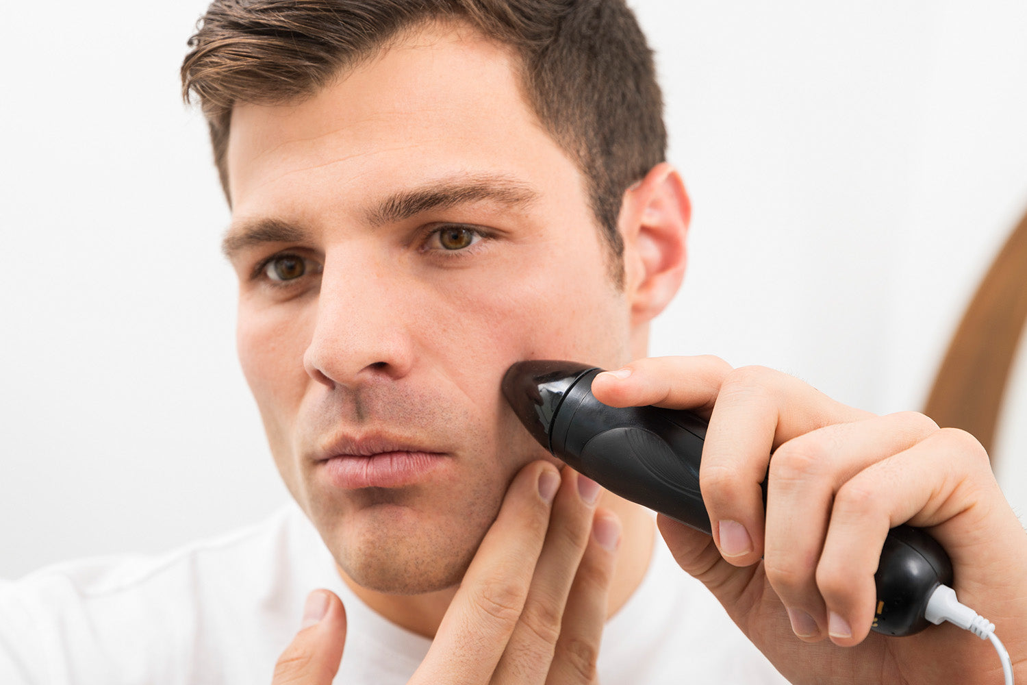 man using personal microderm pro