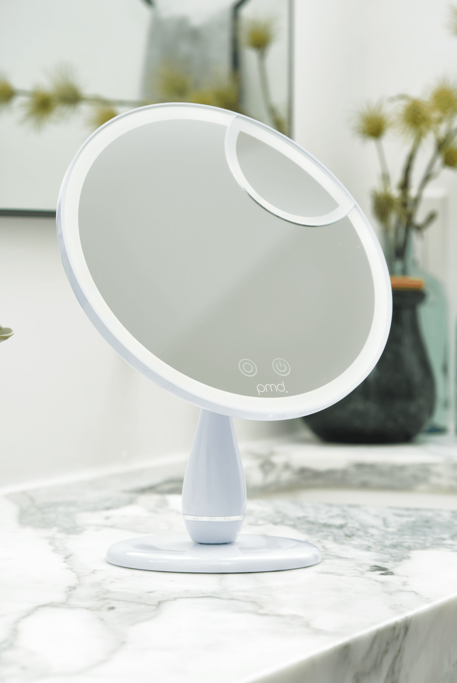 Sleek PMD Beauty Reflect Pro featuring modern design and LED lighting for professional at-home skincare and beauty routines.