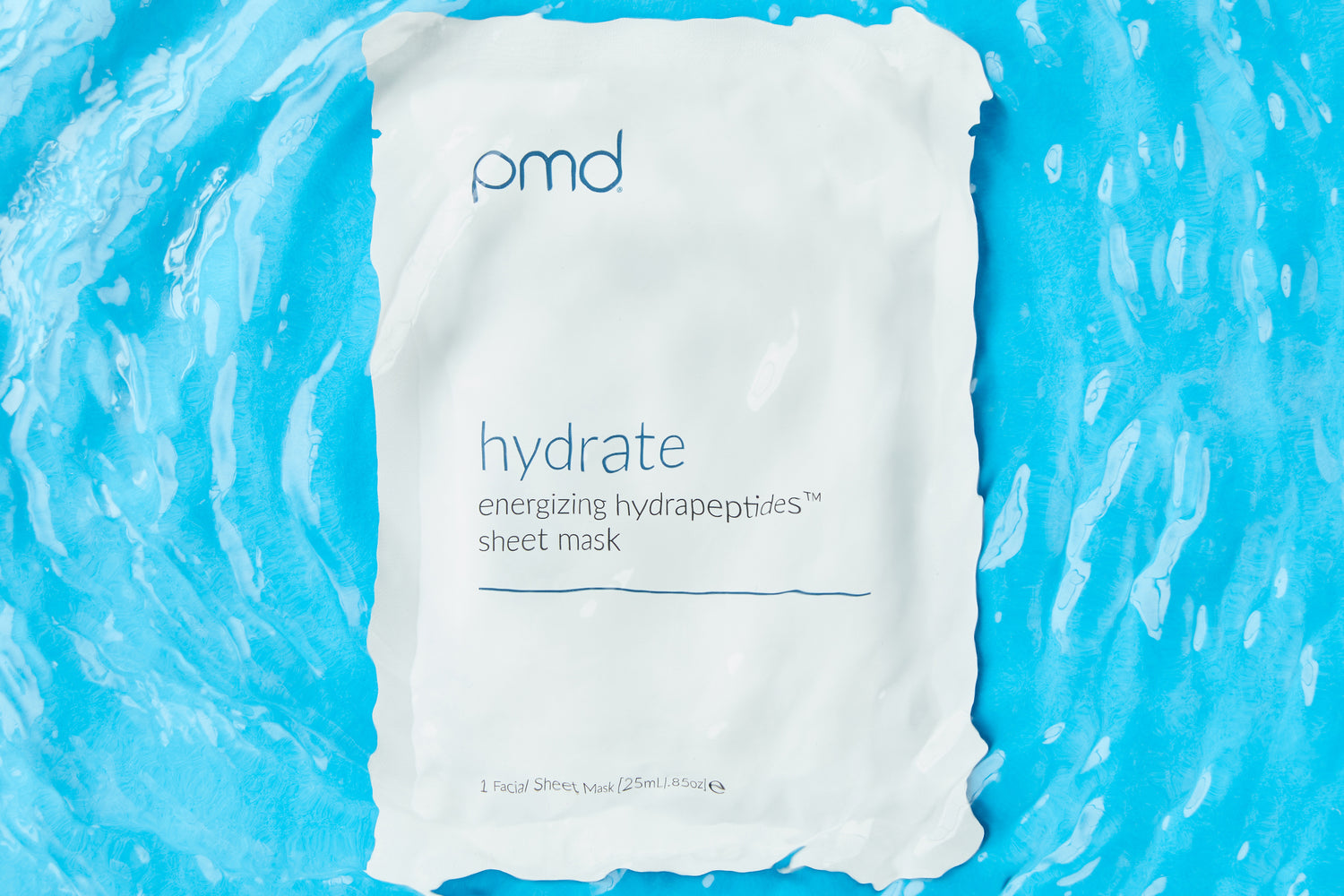 hydrate sheet mask in packaging with blue background under water