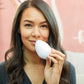 3001-blush?Woman using PMD Kiss to plump her lips