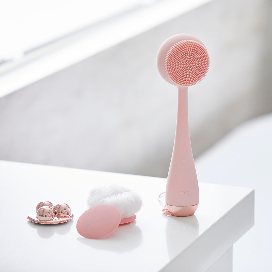 AT-4003-EBlush?PMD Clean Body in Blush on counter with replaceable magnetic attachments