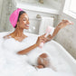 AT-4003-LBlush?Woman in bath using PMD Clean Body 