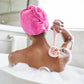 AT-4003-MBlush?Woman using PMD Clean Body in tub to cleanse her back