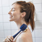 AT-4003-MNavy?Woman using PMD Clean Body in navy to massage back