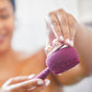 AT-4003-MBerry?Woman removing relax Body Massager Replacement on PMD Clean Body in berry
