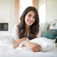 449269?Women holding pillow with white silversilk pillowcase